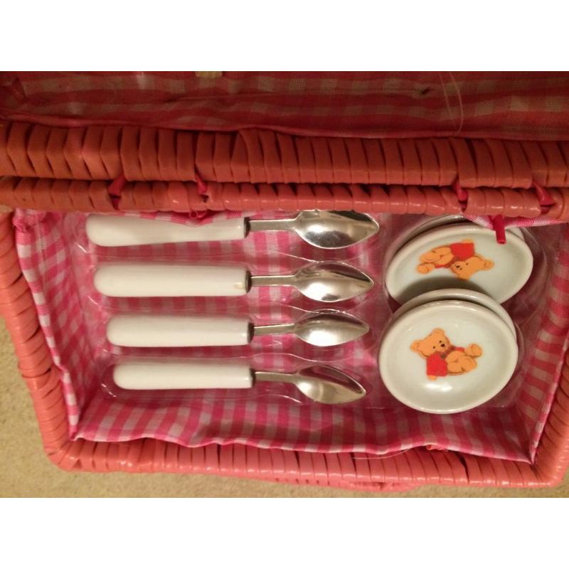 Childrens china tea set in pink basket