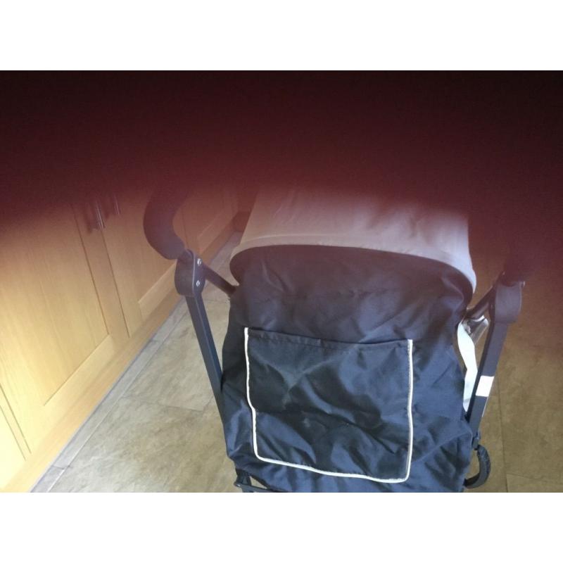 Brand new Hauck baby buggy 0m+ plus rain cover still in box never been used beige/black colour.