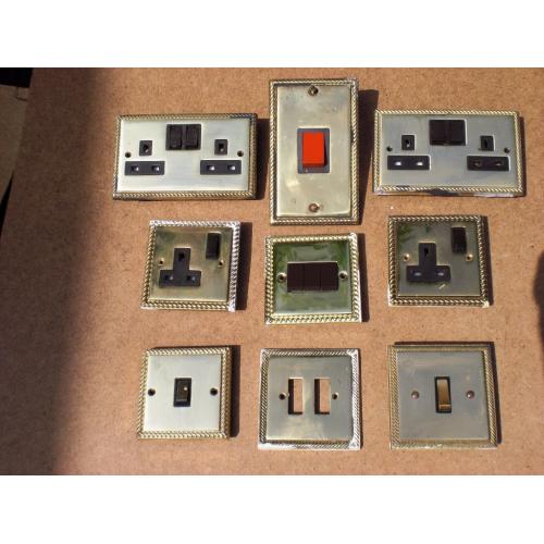 NINE USED BRASS ELECTRICAL FITTINGS - 4 x SOCKS(2 DOUBLE) 4xLIGHT SWITx 1xCOOKER