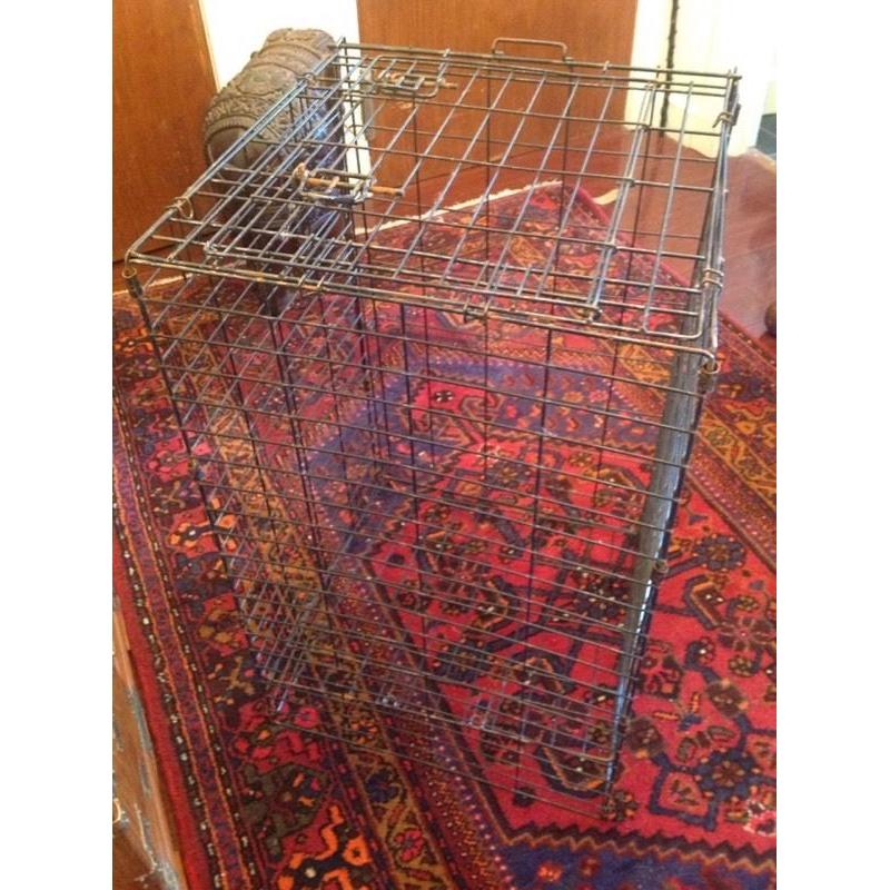 Foldable metal dog cage