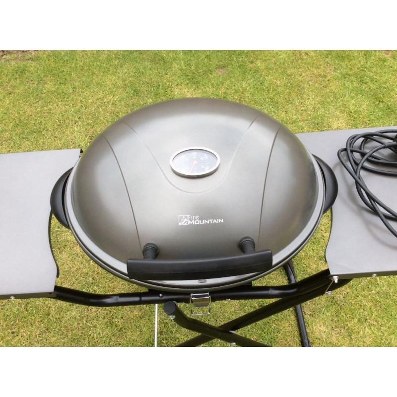 ELECTRIC BBQ (FIRE MOUNTAIN) COOK OUTSIDE OR INSIDE.