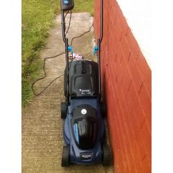 Hi I'm selling a einhell 1000w lawnmower only used once