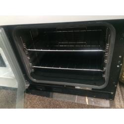 Black & silver new home 60cm ceramic hub electric cooker grill & fan oven good condition with guara