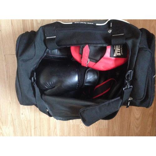 Kick boxing gloves, foot & shin pads, wraps, sparring mits, and bag