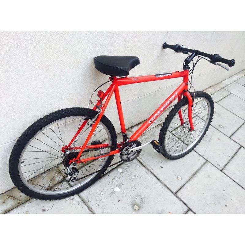 Raleigh red mountain bike gcdfvb