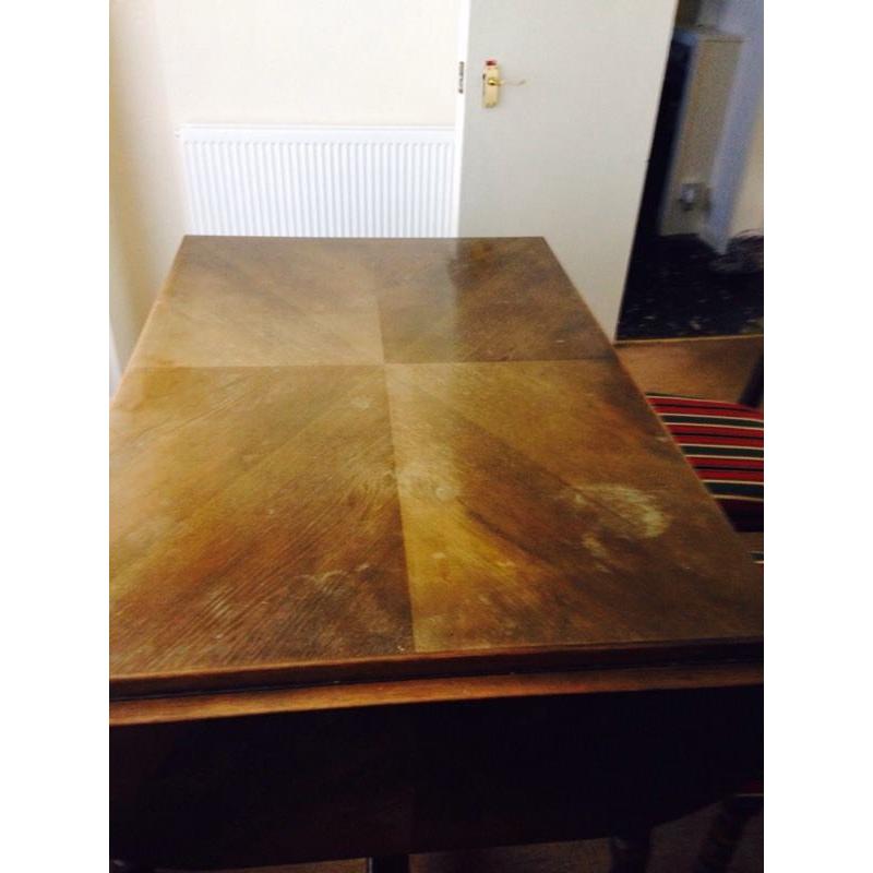 Solid oak extendable table with 6 chairs + cabinet