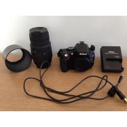 Nikon D5100 + sigma 70-300mm lens and camera bag.