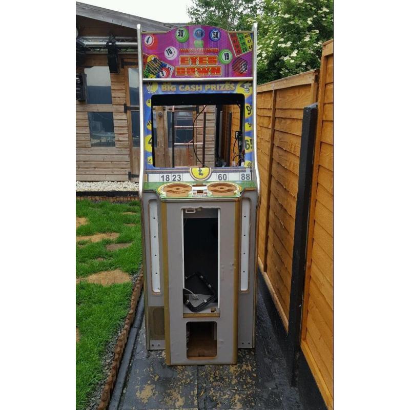Coin operated arcade video machine skill ball bingo