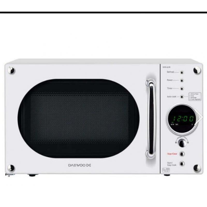 white retro digital daewoo microwave oven under warrantee