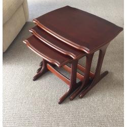 Nest of three tables in Mahogany