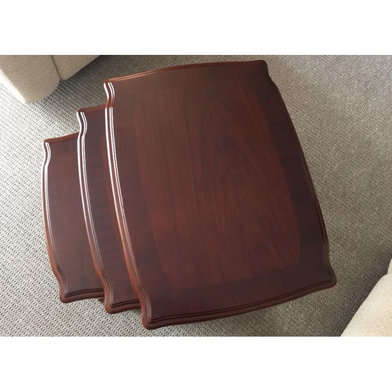Nest of three tables in Mahogany
