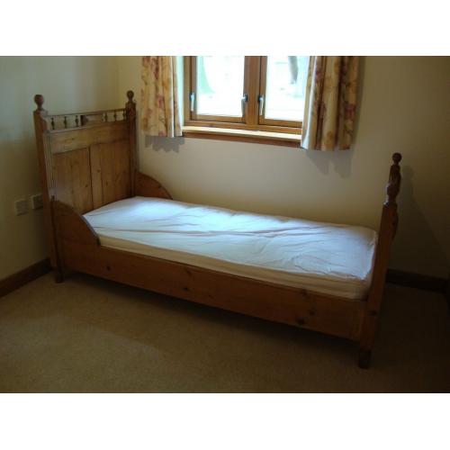 Antique pine sleigh bed