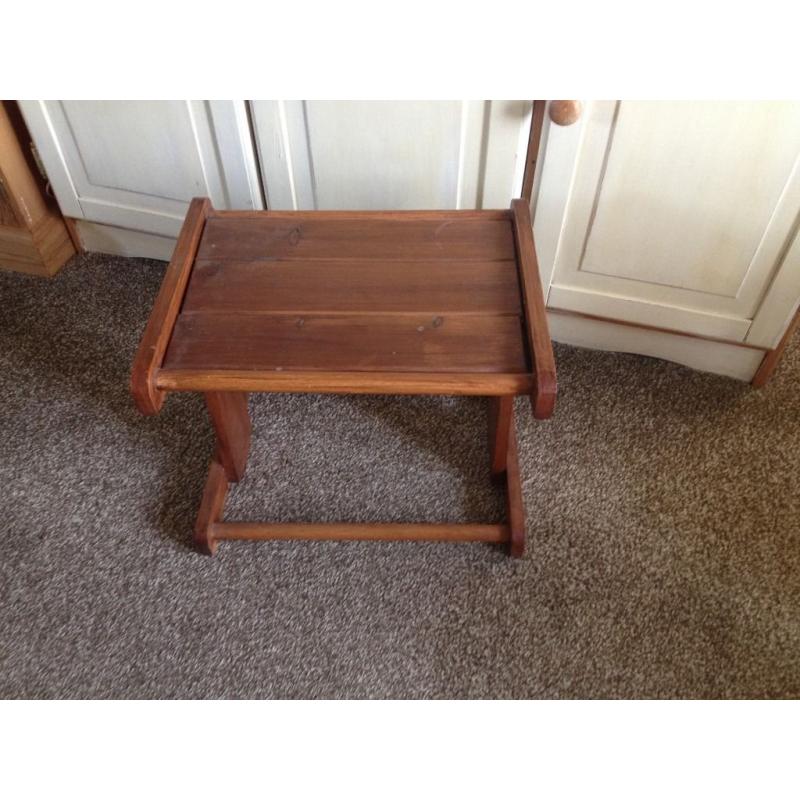 Small wooden coffee table.