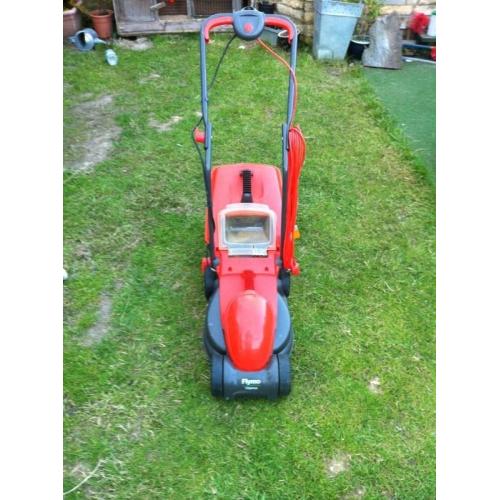 Fly-mo lawn mower with grass box