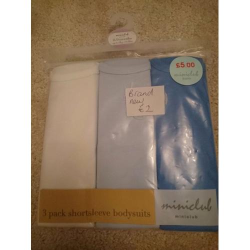 New 6-9m vests 3 pack