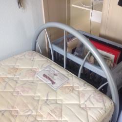 Single bed with metal ends and Dunlopillo mattress...