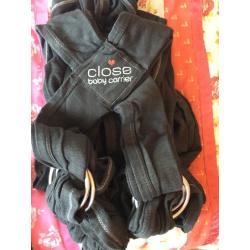 Close baby carrier harness cloth