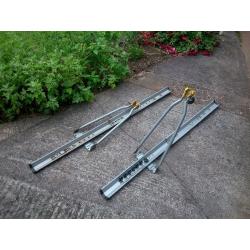 Two roof mounted cycle carriers - Halford's own cheap version - pair for a tenner