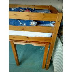 Pine mid-sleeper bed with pull-out desk/side table with instructions