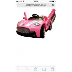 Pink Maserati ride on car
