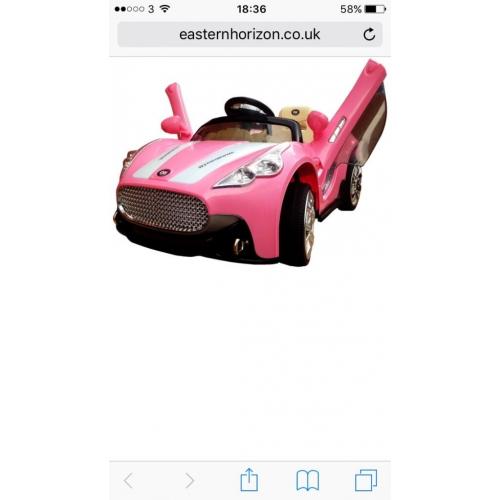 Pink Maserati ride on car