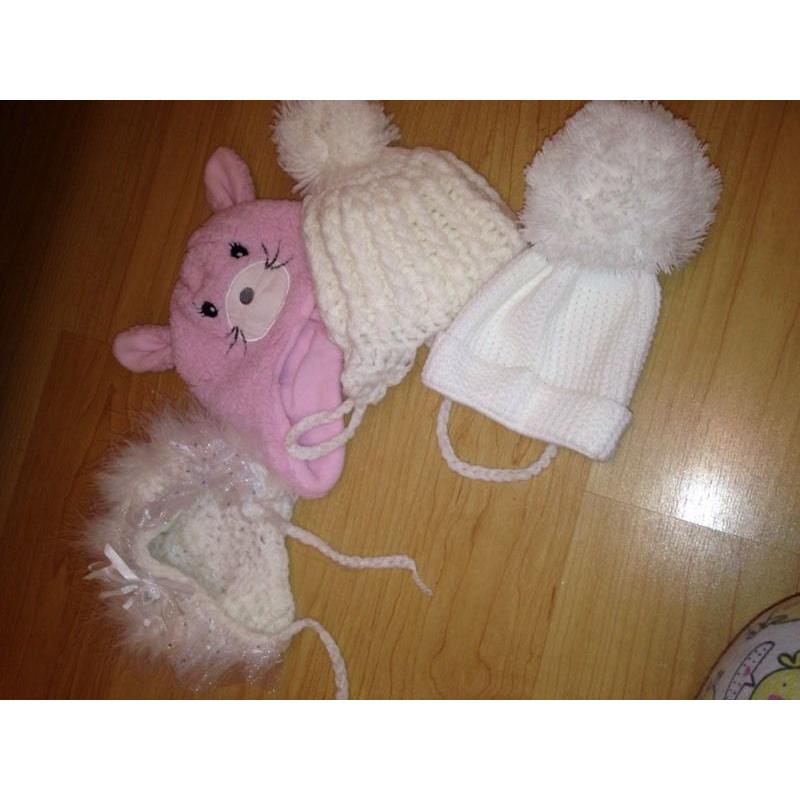 2 snowsuits and handful of hats