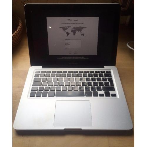 Apple MacBook Pro, 13 inch 2010 model- good condition but battery needs changing. With charger.