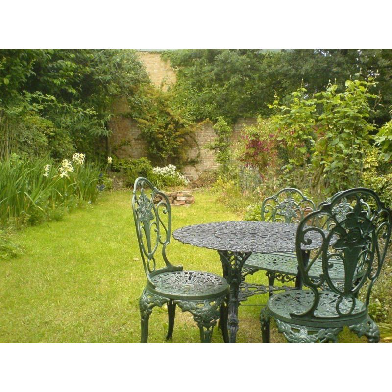 two very large adjoining double bedroom, high ceiling, wooden floor boards with garden view