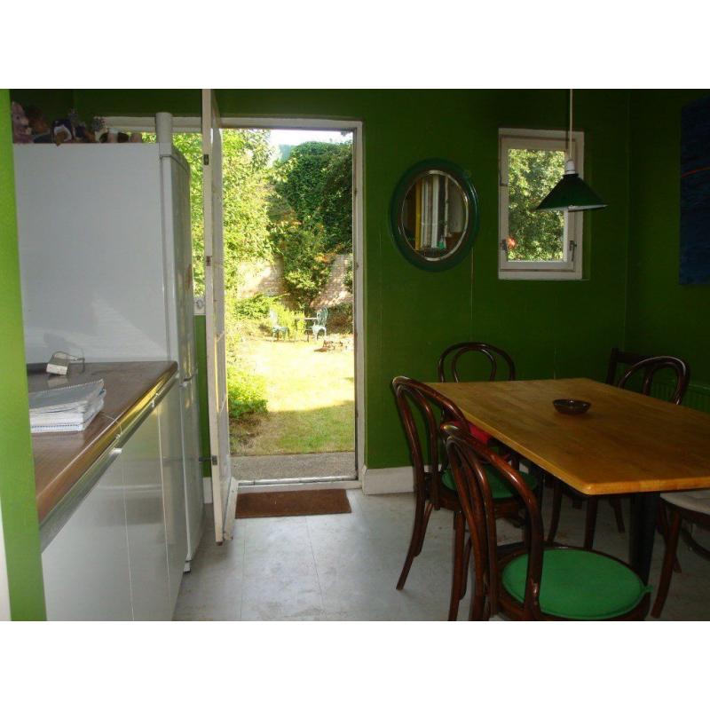 two very large adjoining double bedroom, high ceiling, wooden floor boards with garden view