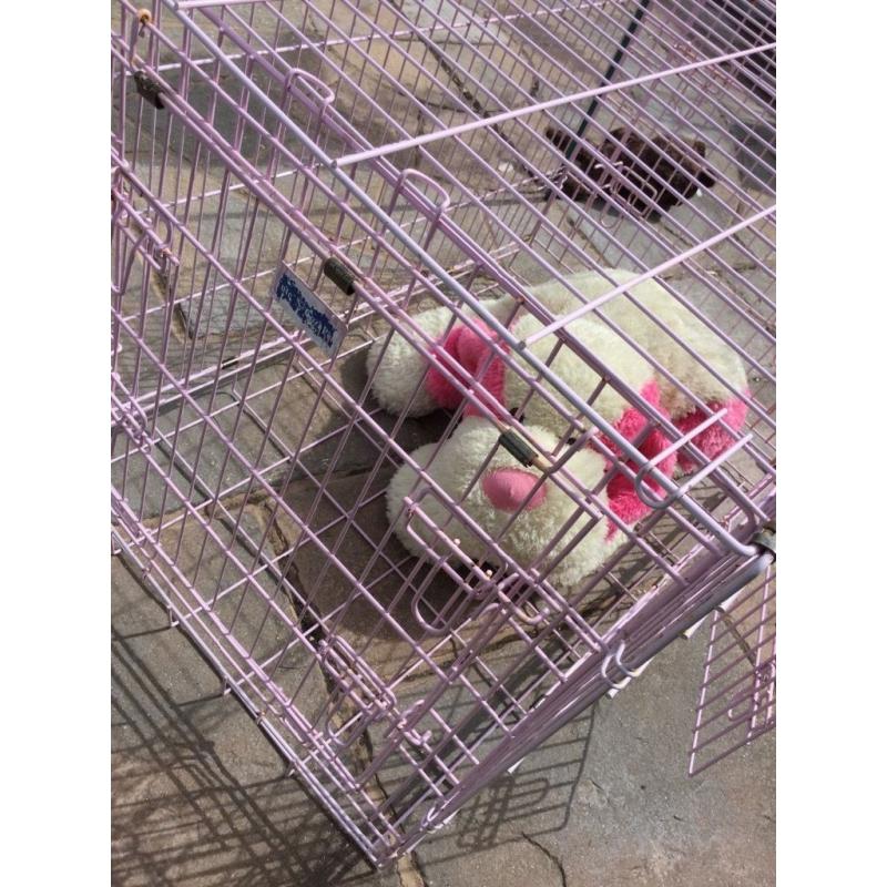 Pet Cage. Pink. Folds flat. Very secure with 3 lockable doors. 36" length (large), removable tray.