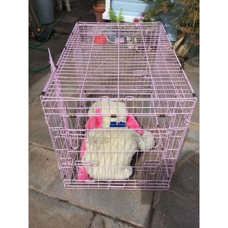Pet Cage. Pink. Folds flat. Very secure with 3 lockable doors. 36" length (large), removable tray.