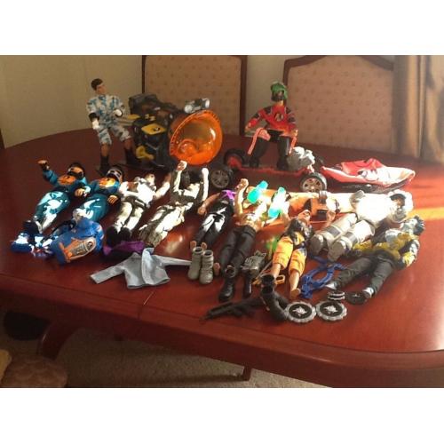 11 Action men with submarine, skateboard, skis and zip wire