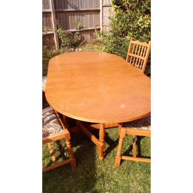 Table and four chairs. Fold down.
