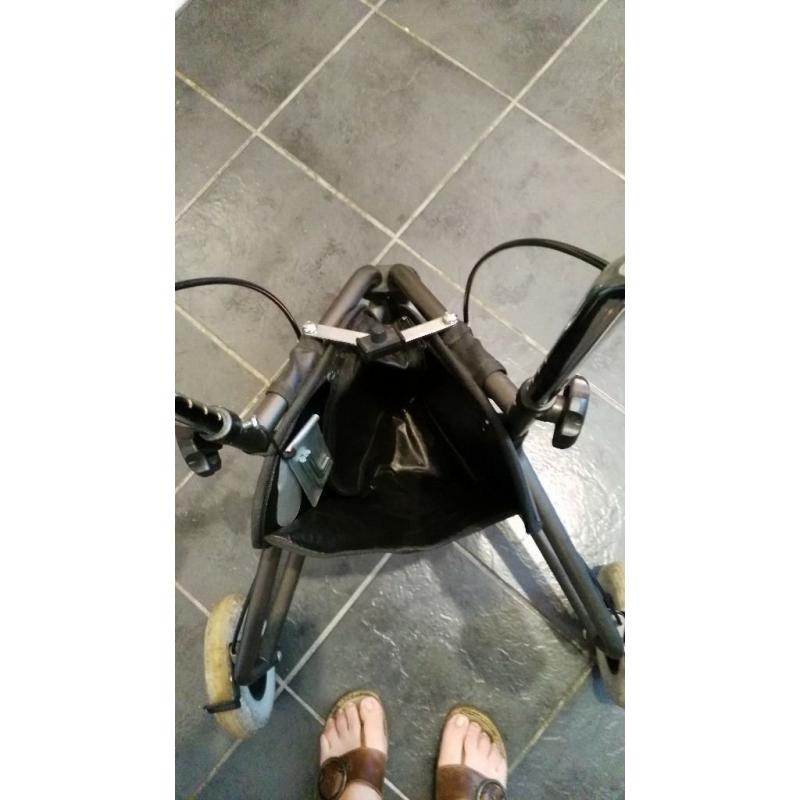 black wheeled walking frame with zipped compartment