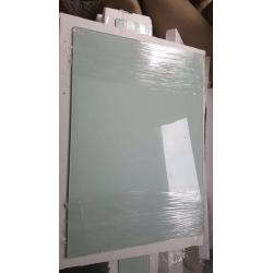 Unused toughened glass splashback and window-sill covering in subtle pistachio tint