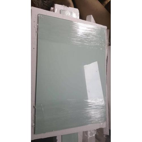 Unused toughened glass splashback and window-sill covering in subtle pistachio tint