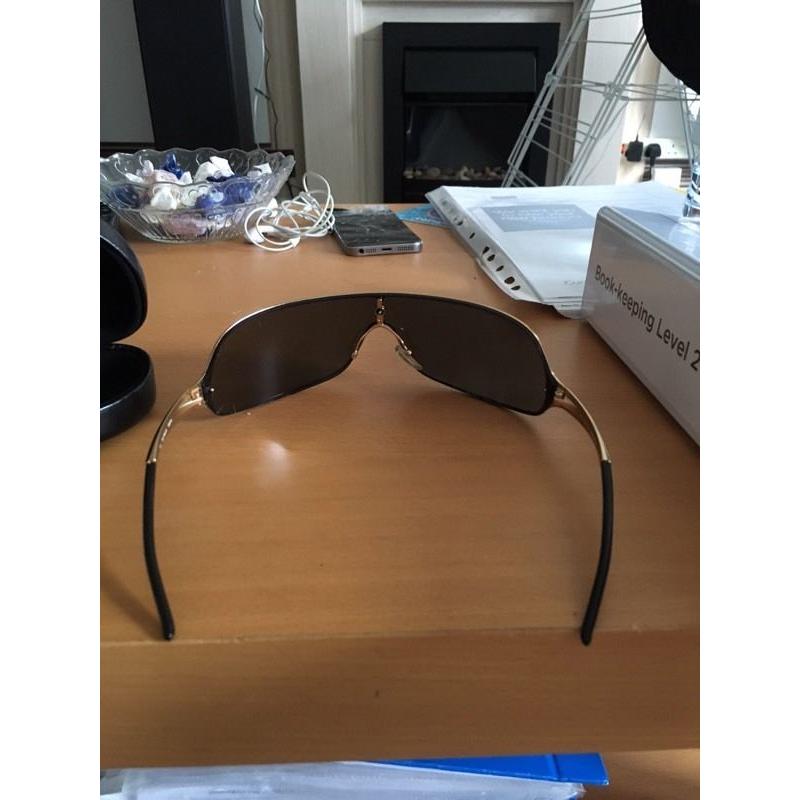 Gucci sunglasses 1690/S black and 1661/S gold frame