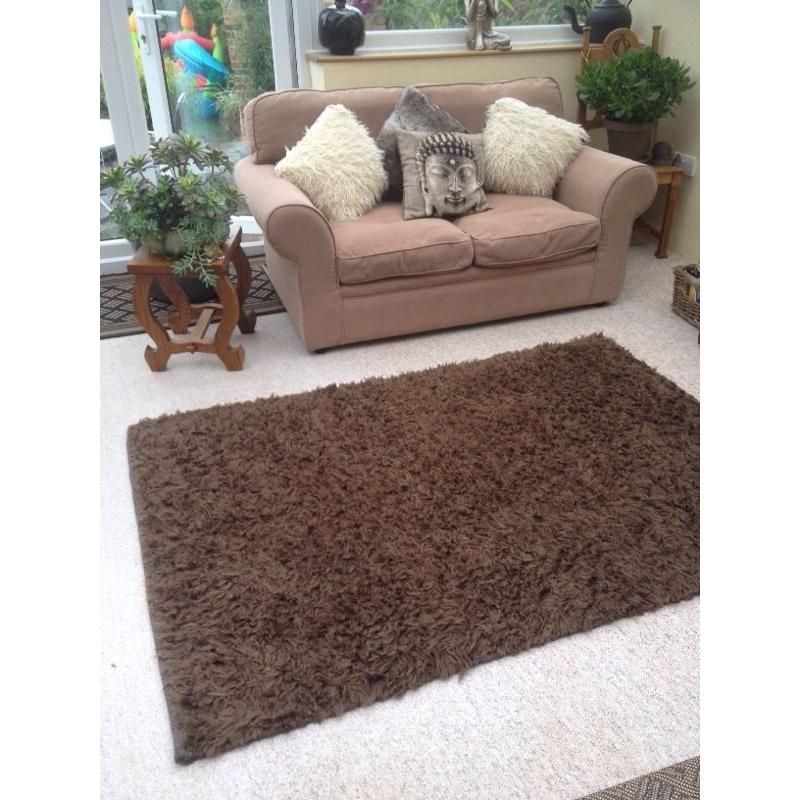 Large brown heavy rug