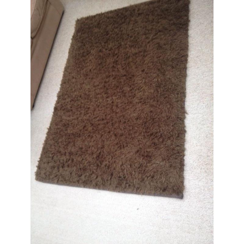 Large brown heavy rug