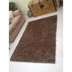 Large brown heavy rug