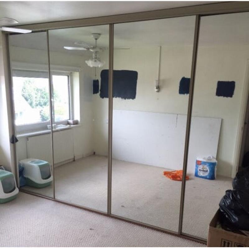Mirrored siding doors and fixings