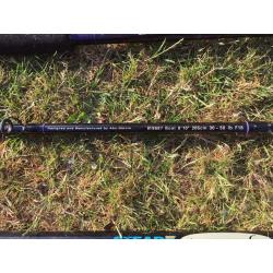 2 beach casters, 2 boat rods and 1 aluminium rod holder