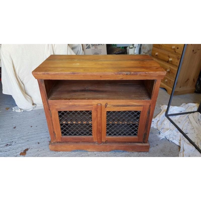 Solid Indian wood cabinet with shelf and two doors, good condition