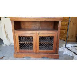 Solid Indian wood cabinet with shelf and two doors, good condition