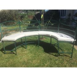 Metal half moon bench with cushions