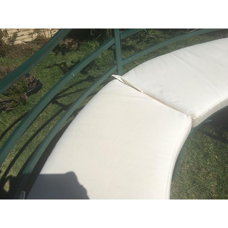 Metal half moon bench with cushions