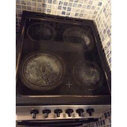 Reduced price black and silver BEKO electric cooker- 4 ceramic hobs, 1 grill and 1 oven door.