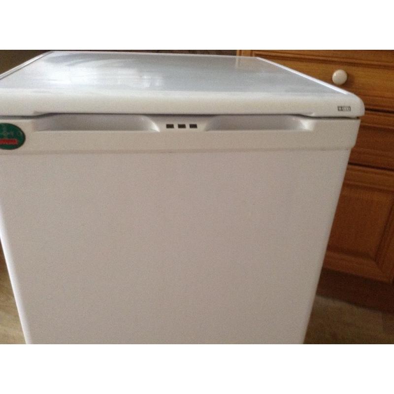 White free standing under work top Freezer