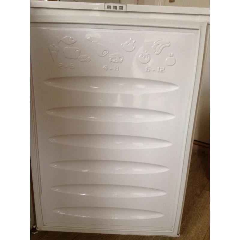 White free standing under work top Freezer