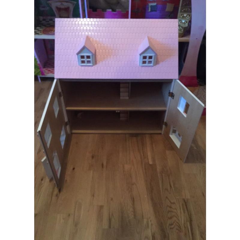 Beautiful and in fantastic condition - two dolls houses for sale